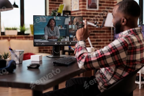 Preview: Male freelancer using online teleconference call