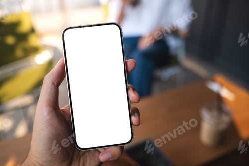 Preview: Mockup image of a man holding mobile phone with blank white screen with a woman in background