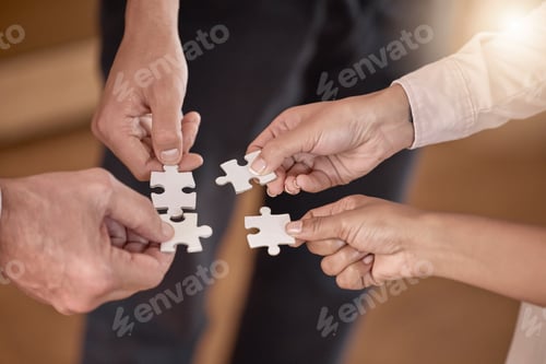 Preview: Business people, hands and puzzle piece in planning, collaboration or teamwork brainstorming at the