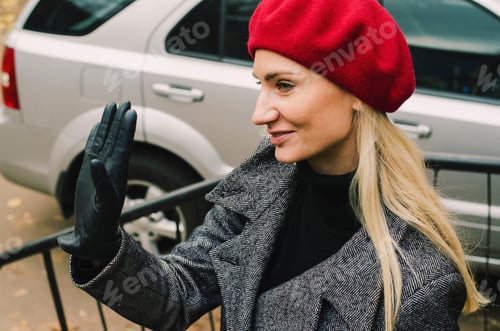 Preview: Stylish Woman in Coat and Red Beret