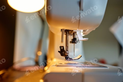 Preview: Close-up of sewing machine needle and presser foot