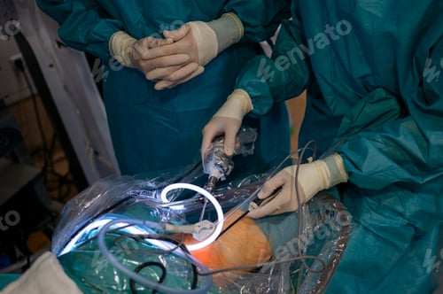 Preview: Team of surgeons operating in the hospital. Healthcare concept