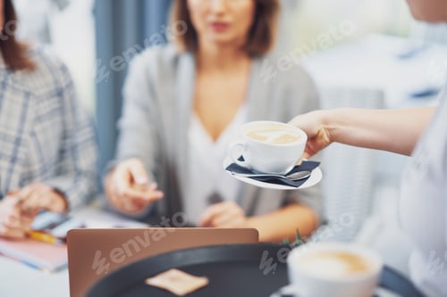 Preview: Picture of coffee on business meeting in restaurant.