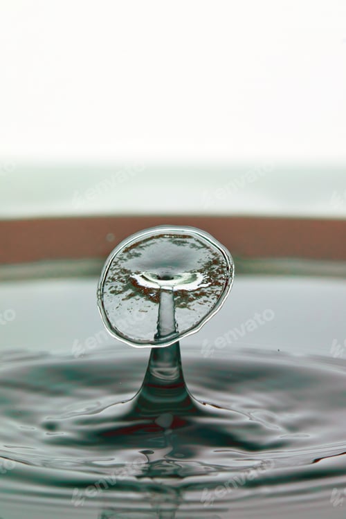 Preview: Abstract background of splash of color water, collision of colored drops, the concept