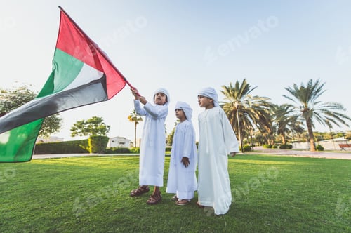 Preview: children playing together in Dubai in the park.