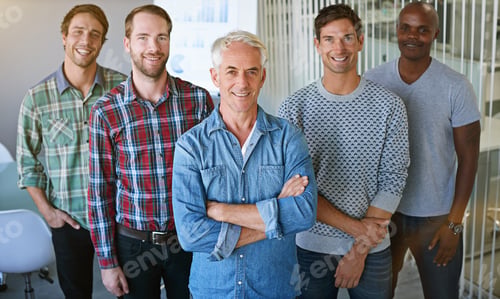 Preview: Portrait of a group of colleagues standing together