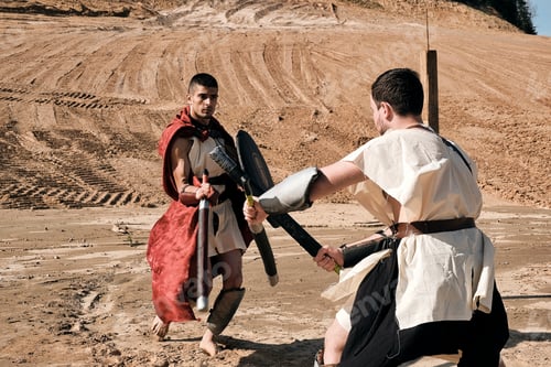 Preview: A Concept Photo Of A Roman Battle Of Two Warriors Of The Colosseum In Action With Aggressive