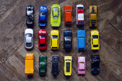 Preview: assorted colorful car collection on floor