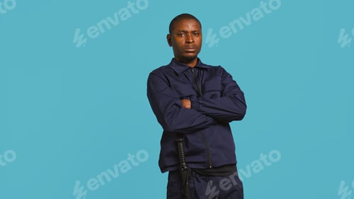Preview: Portrait of menacing security guard in threatening pose
