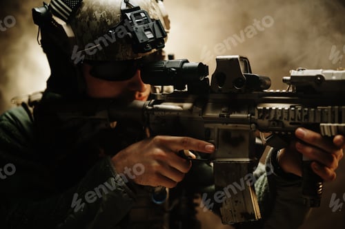 Preview: Special forces soldier aiming with his rifle in fog