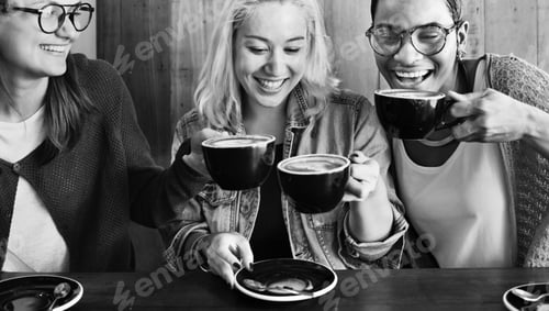 Preview: Friends having coffee at a cafe