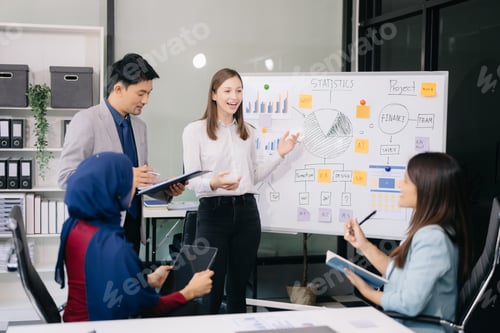 Preview: Creative business people working on business project in office