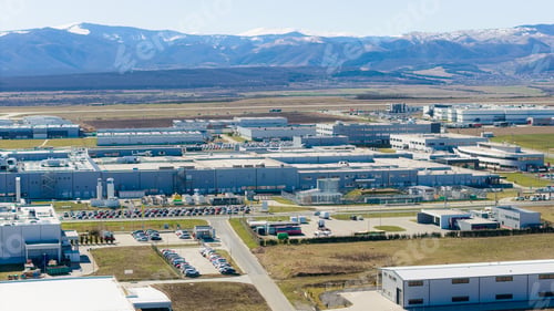 Preview: Industrial park with modern factories and warehouses