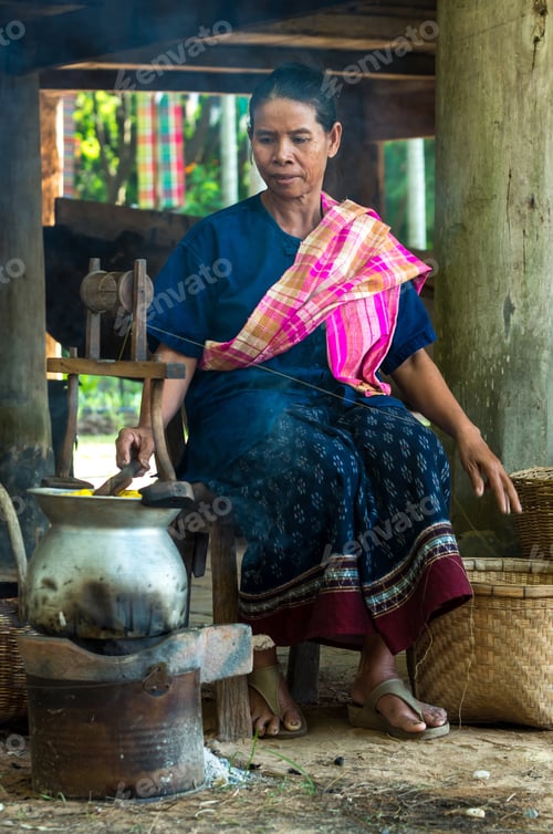 Preview: woman was weaving silk fabric by method and machine traditional