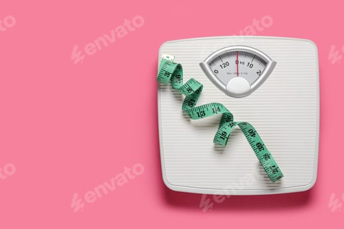 Preview: Bathroom scale and measure tape on pink background, top view. Space for text