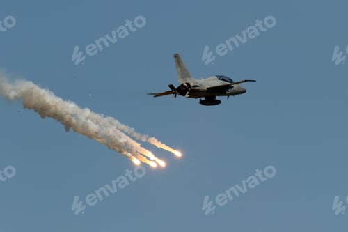 Preview: Jet aircraft flying in the sky and fireworks smoking below