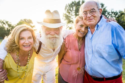 Preview: Group of senior people bonding outdoors