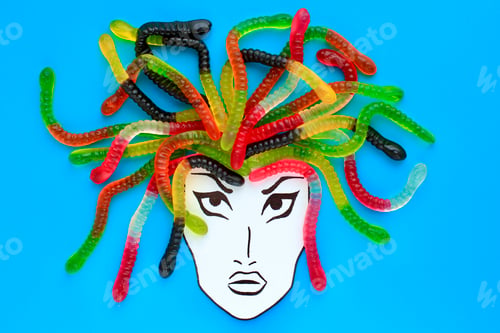 Preview: Jelly worms or snakes candies lying like a woman's or Gorgon's Medusa hair. concept of food, sweets