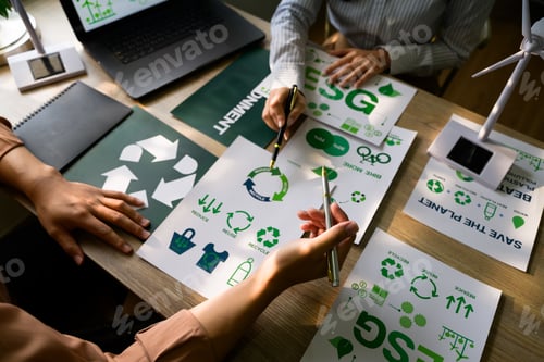 Preview: Managers discussing esg strategy for environment conservation with recycle symbol