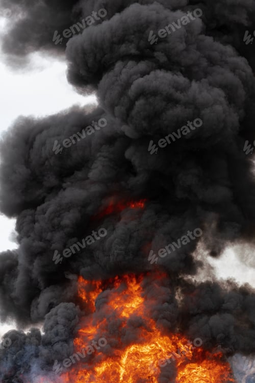 Preview: Flames of Red Fire and Motion Clouds of Black Smoke Covered Sky