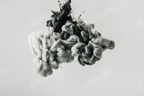 Preview: close up view of mixing of light gray and black paints splashes in water isolated on gray