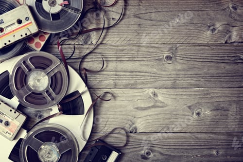 Preview: Old audio reels and cassette tape background