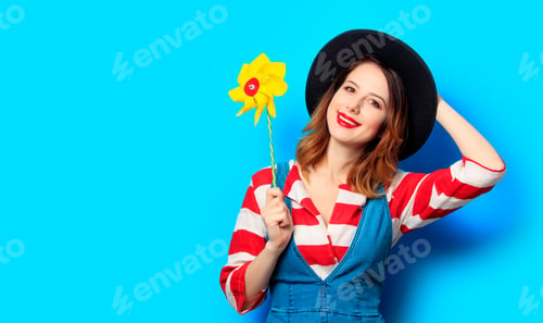 Preview: surprised woman with pinwheel