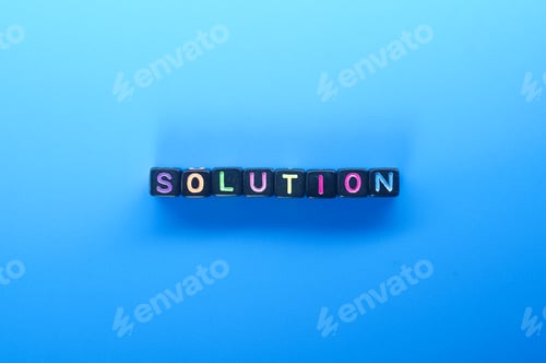 Preview: small black cube with the word solution. problem solving concept