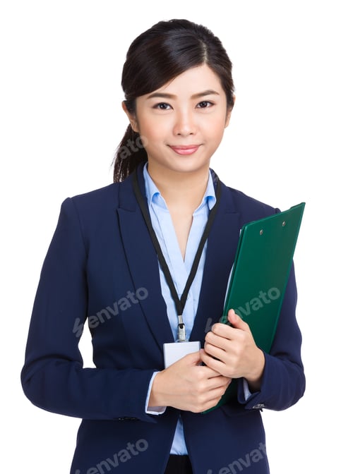 Preview: Smiling businesswoman holding clipboard