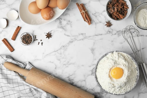 Preview: Flat lay composition with flour, eggs and spices on light grey background