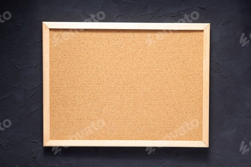 Preview: cork board at dark concrete painted wall