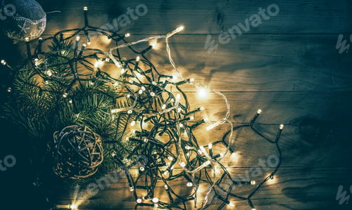 Preview: christmas lights on wooden vintage background
