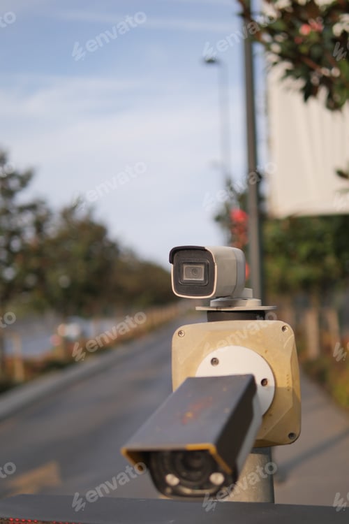 Preview: Urban security camera placements near vehicles captured in video footage