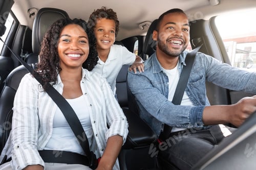 Preview: Happy African American Family With Son Sitting Inside Of Car