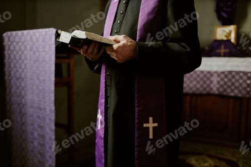 Preview: Unrecognizable Pastor Reading Religious Text