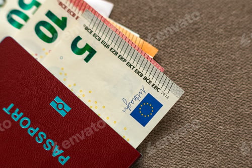 Preview: Travel passport and money, Euro banknotes bills on copy space background, top view.