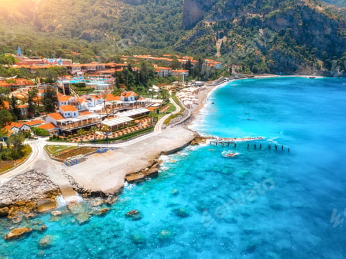 Preview: Aerial view of beautiful hotel and blue sea at sunny day