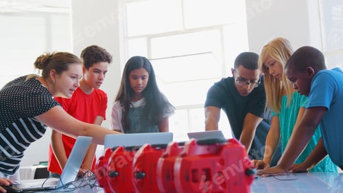 Preview: Students With Male And Female Teachers In School Computer Coding Class Learn To Program