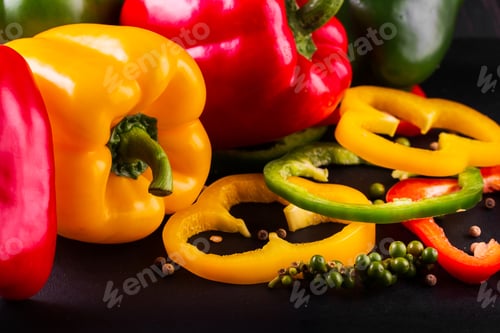 Preview: Three sweet peppers on a wooden background, Cooking vegetable salad