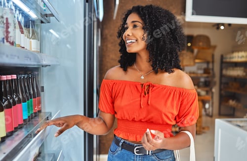Preview: Happy, grocery shopping and woman in a supermarket with drinks at a retail store in Sao Paulo. Happ