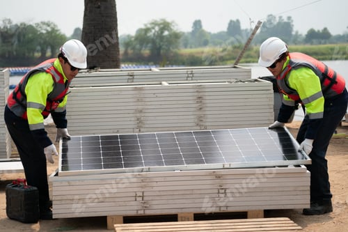 Preview: Renewable Energy Eco Technology Electric Power. Floating solar panels on lake.