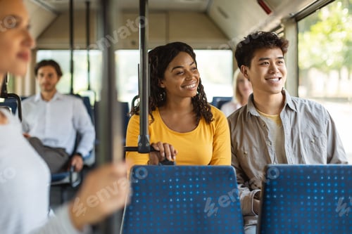 Preview: Happy asian guy and black lady taking bus together