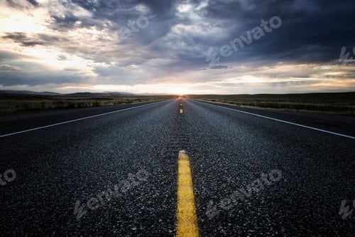 Preview: View down the center line of a state highway at sunset in eastern Washington, USA.