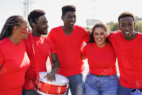 Preview: African people football supporter fans watching soccer match event at stadium
