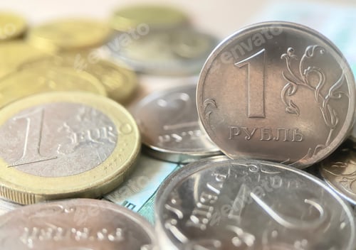 Preview: Russian rubles and euro coins with selective focus. Economic crisis, decline of the world economy