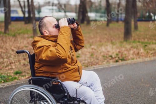 Preview: Paraplegic man outdoor