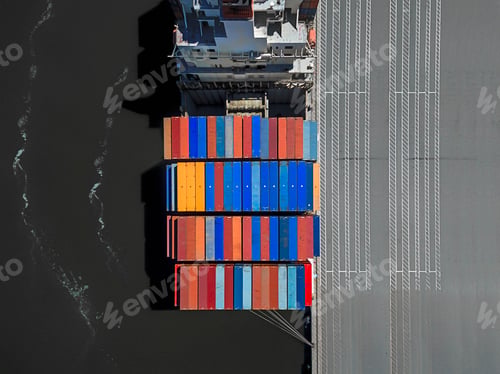 Preview: The Port of Oakland, in California. A container ship at the dockside, viewed from above.