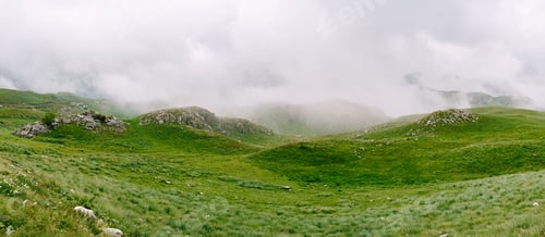Preview: Mountains in dense fog in Durmitor National Park. Montenegro, north