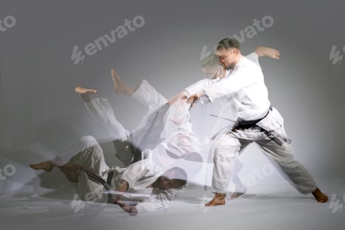 Preview: Two Caucasian Men Are Practicing Aikido On The Tatami