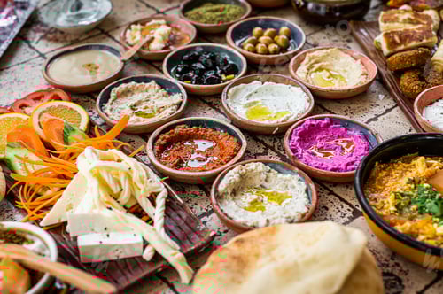 Preview: Delicious Turkish family breakfast table with pastries, vegetables, greens, spreads, cheeses, fried